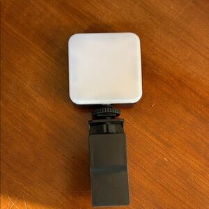 Compact Black and White Camera Accessory